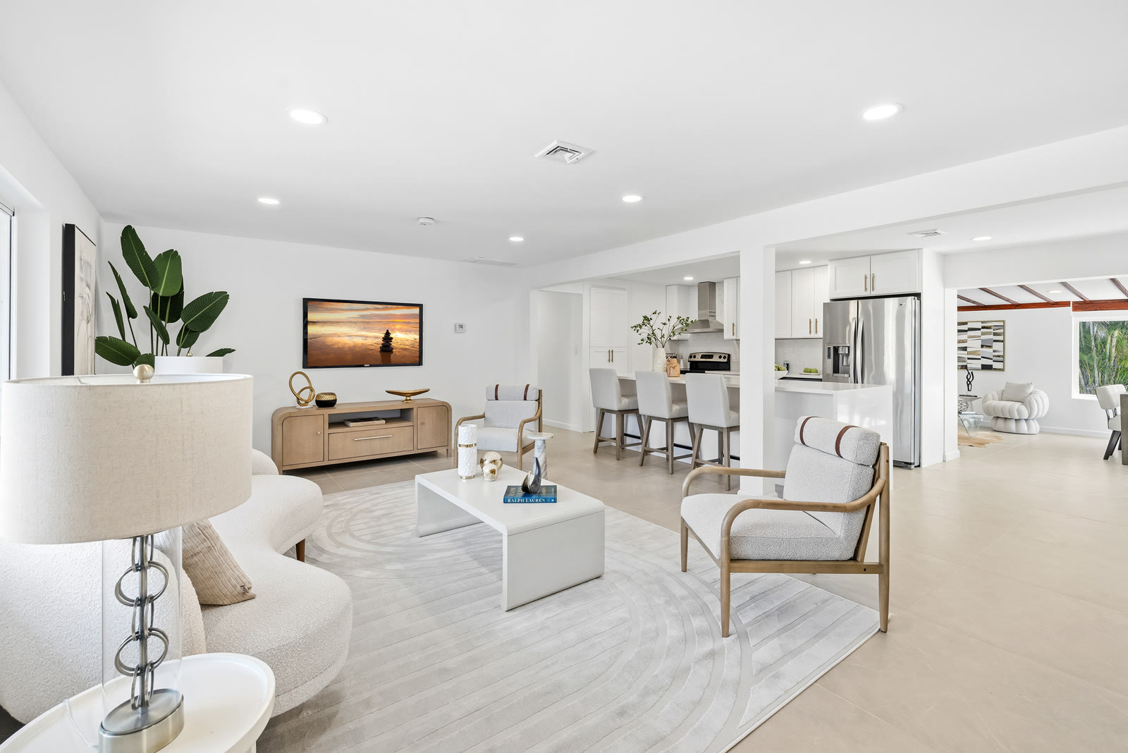 Modern open concept living room and kitchen in a South Florida luxury home
